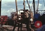 Image of offshore oil rig Atlantic Ocean, 1965, second 49 stock footage video 65675061603