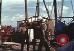 Image of offshore oil rig Atlantic Ocean, 1965, second 50 stock footage video 65675061603