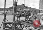 Image of American Army Corps of engineers rebuilding a bridge in South Korea during hostilities Korea, 1951, second 5 stock footage video 65675061713