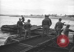Image of American Army Corps of engineers rebuilding a bridge in South Korea during hostilities Korea, 1951, second 13 stock footage video 65675061713