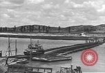 Image of American Army Corps of engineers rebuilding a bridge in South Korea during hostilities Korea, 1951, second 25 stock footage video 65675061713