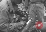 Image of American Army Corps of engineers rebuilding a bridge in South Korea during hostilities Korea, 1951, second 49 stock footage video 65675061713