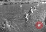 Image of American infantry wading through water Korea, 1953, second 5 stock footage video 65675061714