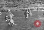 Image of American infantry wading through water Korea, 1953, second 6 stock footage video 65675061714