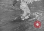 Image of American infantry wading through water Korea, 1953, second 10 stock footage video 65675061714