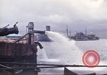 Immagine di Pompaggio di acqua Pearl Harbor Hawaii USA, 1942, secondo 14 filmato di repertorio 65675061813