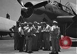Image of Douglas SBD Dauntless aircraft start and taxi Pearl Harbor Hawaii USA, 1942, second 4 stock footage video 65675061841