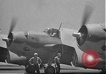Image of Douglas SBD Dauntless aircraft start and taxi Pearl Harbor Hawaii USA, 1942, second 57 stock footage video 65675061841