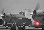 Image of Douglas SBD Dauntless aircraft start and taxi Pearl Harbor Hawaii USA, 1942, second 58 stock footage video 65675061841
