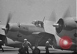 Image of Douglas SBD Dauntless aircraft start and taxi Pearl Harbor Hawaii USA, 1942, second 59 stock footage video 65675061841
