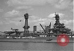Image of USS Colorado (BB-45) maneuvering to Berth F-12A Pearl Harbor Hawaii USA, 1942, second 29 stock footage video 65675061843