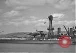 Image of USS Colorado (BB-45) maneuvering to Berth F-12A Pearl Harbor Hawaii USA, 1942, second 40 stock footage video 65675061843