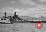 Image of USS Colorado (BB-45) maneuvering to Berth F-12A Pearl Harbor Hawaii USA, 1942, second 54 stock footage video 65675061843