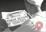 Image of United States sailors learn about end of World War II Hawaii USA, 1945, second 17 stock footage video 65675061871