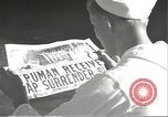 Image of United States sailors learn about end of World War II Hawaii USA, 1945, second 18 stock footage video 65675061871