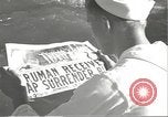 Image of United States sailors learn about end of World War II Hawaii USA, 1945, second 21 stock footage video 65675061871