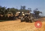 Immagine di La costruzione dell'autostrada Il Vietnam, 1969, secondo 20 filmato di repertorio 65675062015