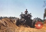 Immagine di La costruzione dell'autostrada Il Vietnam, 1969, secondo 55 filmato di repertorio 65675062015