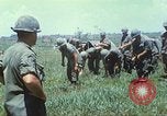 Image of Memorial ceremony for fallen of 199th Light Infantry Brigade South Vietnam, 1968, second 11 stock footage video 65675062054
