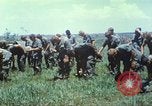 Image of Memorial ceremony for fallen of 199th Light Infantry Brigade South Vietnam, 1968, second 24 stock footage video 65675062054