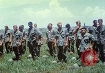 Image of Memorial ceremony for fallen of 199th Light Infantry Brigade South Vietnam, 1968, second 32 stock footage video 65675062054