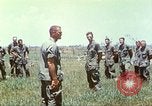 Image of Memorial ceremony for fallen of 199th Light Infantry Brigade South Vietnam, 1968, second 51 stock footage video 65675062054