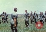 Image of Memorial ceremony for fallen of 199th Light Infantry Brigade South Vietnam, 1968, second 54 stock footage video 65675062054