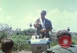 Image of Chaplain ministering to 199th Light Infantry Brigade South Vietnam, 1968, second 13 stock footage video 65675062056
