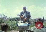Image of Chaplain ministering to 199th Light Infantry Brigade South Vietnam, 1968, second 18 stock footage video 65675062056
