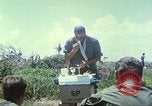 Image of Chaplain ministering to 199th Light Infantry Brigade South Vietnam, 1968, second 19 stock footage video 65675062056