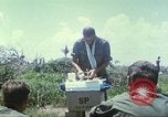 Image of Chaplain ministering to 199th Light Infantry Brigade South Vietnam, 1968, second 21 stock footage video 65675062056