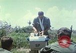 Image of Chaplain ministering to 199th Light Infantry Brigade South Vietnam, 1968, second 22 stock footage video 65675062056