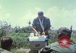 Image of Chaplain ministering to 199th Light Infantry Brigade South Vietnam, 1968, second 23 stock footage video 65675062056