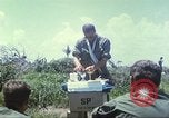 Image of Chaplain ministering to 199th Light Infantry Brigade South Vietnam, 1968, second 25 stock footage video 65675062056