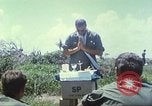 Image of Chaplain ministering to 199th Light Infantry Brigade South Vietnam, 1968, second 26 stock footage video 65675062056