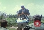 Image of Chaplain ministering to 199th Light Infantry Brigade South Vietnam, 1968, second 27 stock footage video 65675062056