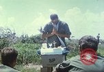 Image of Chaplain ministering to 199th Light Infantry Brigade South Vietnam, 1968, second 28 stock footage video 65675062056