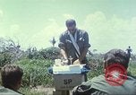 Image of Chaplain ministering to 199th Light Infantry Brigade South Vietnam, 1968, second 30 stock footage video 65675062056