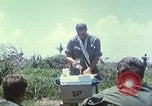 Image of Chaplain ministering to 199th Light Infantry Brigade South Vietnam, 1968, second 31 stock footage video 65675062056