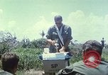 Image of Chaplain ministering to 199th Light Infantry Brigade South Vietnam, 1968, second 32 stock footage video 65675062056