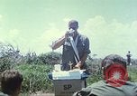 Image of Chaplain ministering to 199th Light Infantry Brigade South Vietnam, 1968, second 33 stock footage video 65675062056