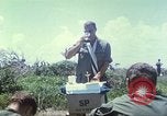 Image of Chaplain ministering to 199th Light Infantry Brigade South Vietnam, 1968, second 35 stock footage video 65675062056