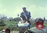 Image of Chaplain ministering to 199th Light Infantry Brigade South Vietnam, 1968, second 36 stock footage video 65675062056