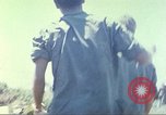 Image of Chaplain ministering to 199th Light Infantry Brigade South Vietnam, 1968, second 39 stock footage video 65675062056