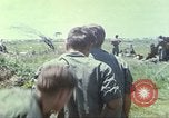 Image of Chaplain ministering to 199th Light Infantry Brigade South Vietnam, 1968, second 40 stock footage video 65675062056