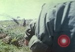 Image of Chaplain ministering to 199th Light Infantry Brigade South Vietnam, 1968, second 42 stock footage video 65675062056