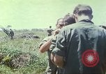 Image of Chaplain ministering to 199th Light Infantry Brigade South Vietnam, 1968, second 43 stock footage video 65675062056