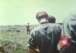 Image of Chaplain ministering to 199th Light Infantry Brigade South Vietnam, 1968, second 44 stock footage video 65675062056