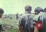 Image of Chaplain ministering to 199th Light Infantry Brigade South Vietnam, 1968, second 46 stock footage video 65675062056