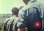 Image of Chaplain ministering to 199th Light Infantry Brigade South Vietnam, 1968, second 48 stock footage video 65675062056